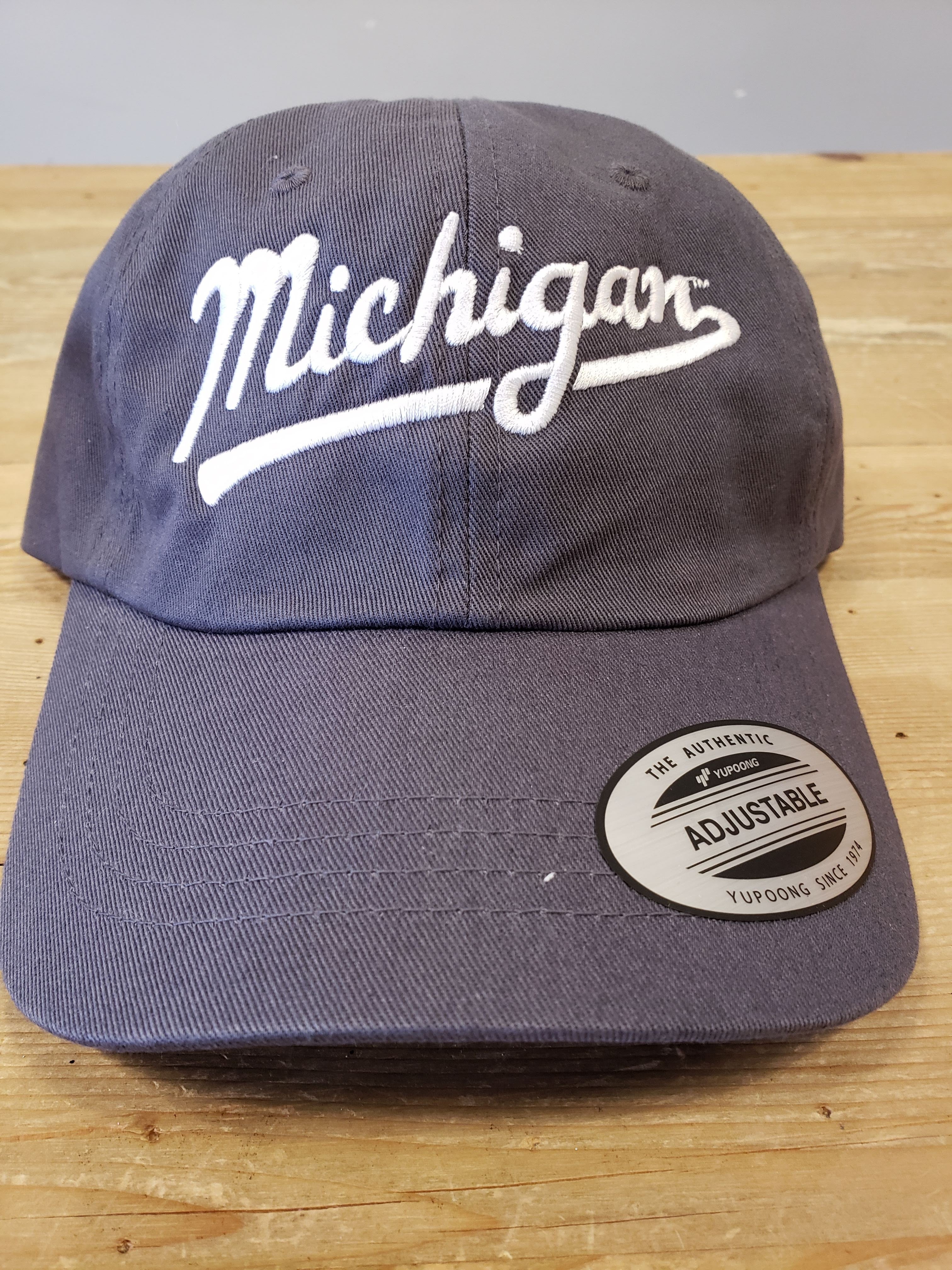 Embroidered Michigan Hat by Enjoy Michigan - Blue Gray hat with white Michigan script embroidered across the front